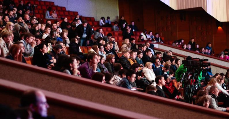 Event - People Sitting Watching In The Theater