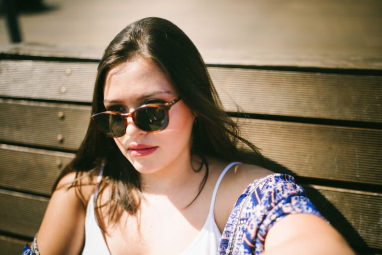 Debuts - woman sitting near wall