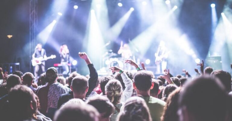 Concert - Crowd in Front of People Playing Musical Instrument during Nighttime