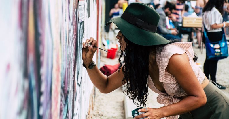 Artists - Photo of Woman Painting on Wall